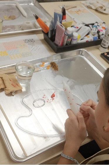 Atelier de peinture sur chandelle
